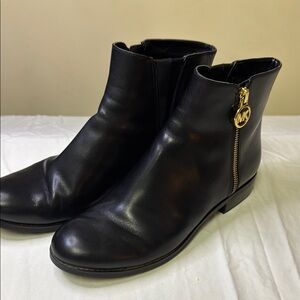 Michael Kors Black and‎ Gold Ankle Booties with Streamlined Silhouette